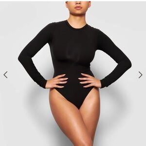 NWT Skims fits everybody long sleeve crew neck bodysuit, onyx/ black size medium